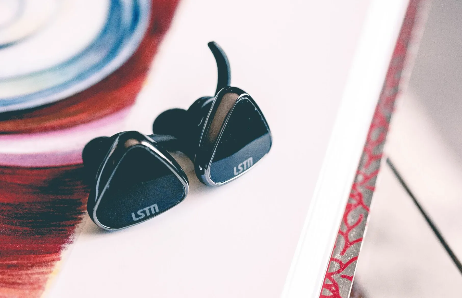 Wireless Earbuds in White or Black - Gives hearing aids to people in need