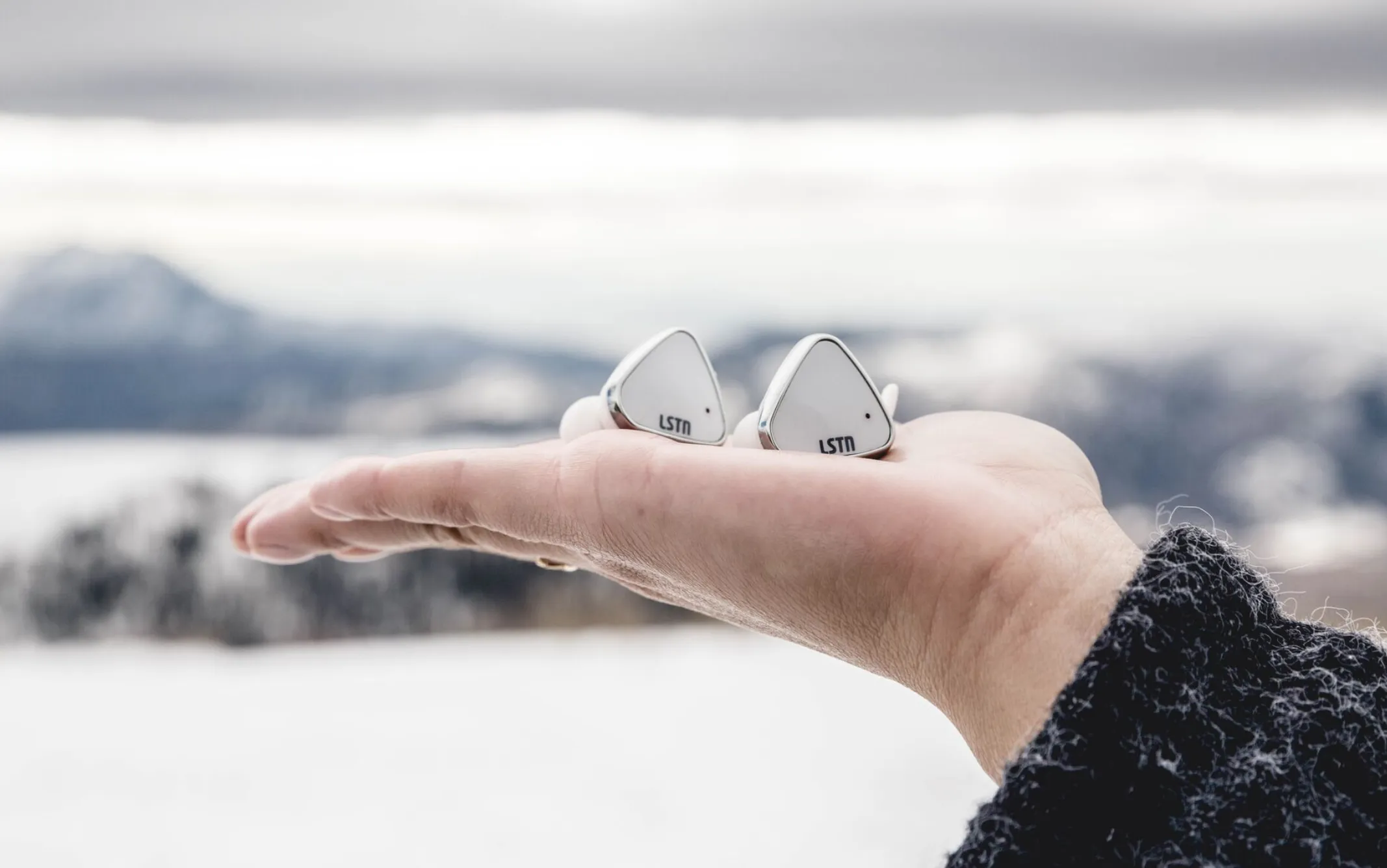 Wireless Earbuds in White or Black - Gives hearing aids to people in need